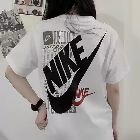 NIKE Tシャツ レディース